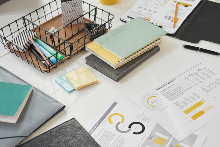 Financial reports at the table